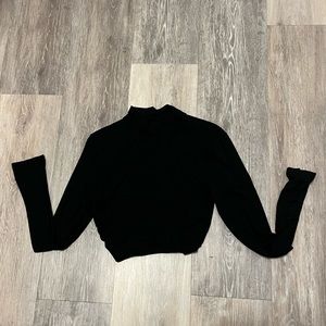 Long sleeve turtle neck open back crop top